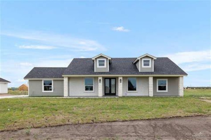 HOUSE ON HALF AN ACRE